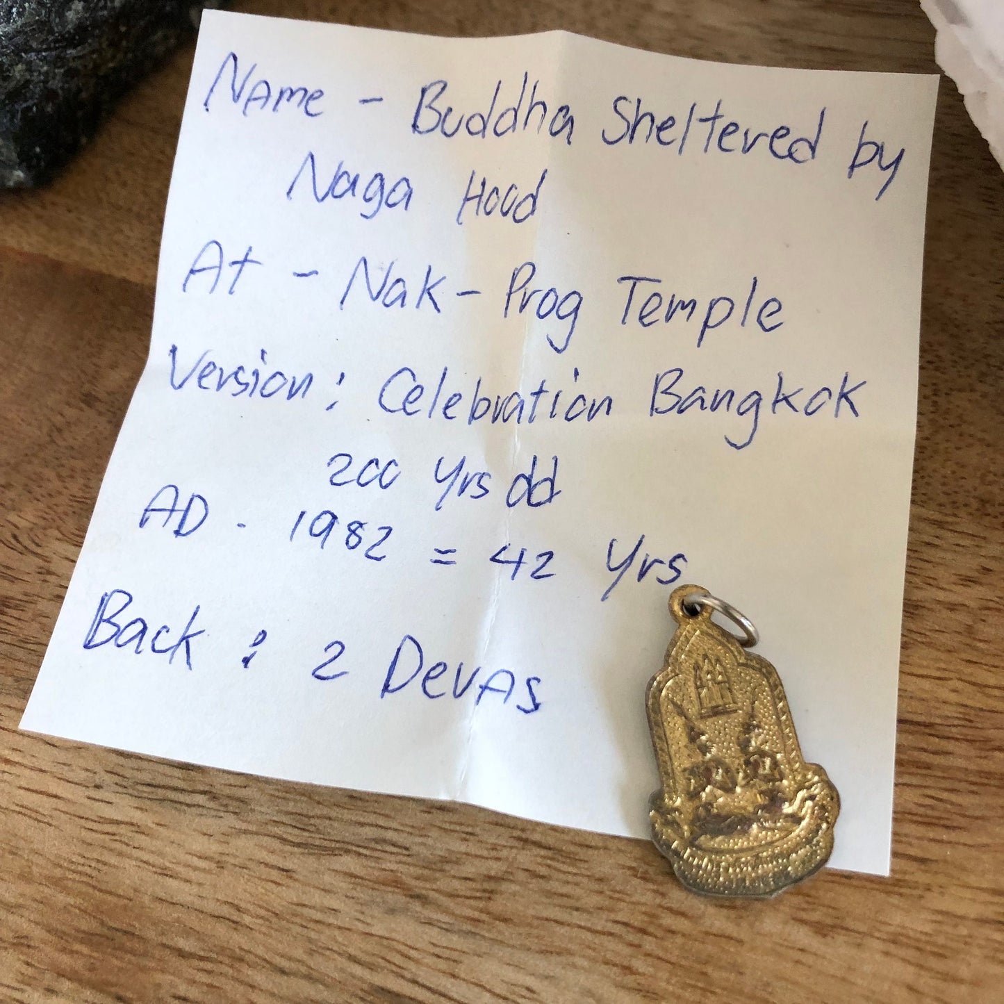 Buddha sheltered by Naga Hood, 2 devas, At Nak Prog Temple, Celebration Bangkok, AD 1982 42 years. Authentic Thailand Buddha Pendant