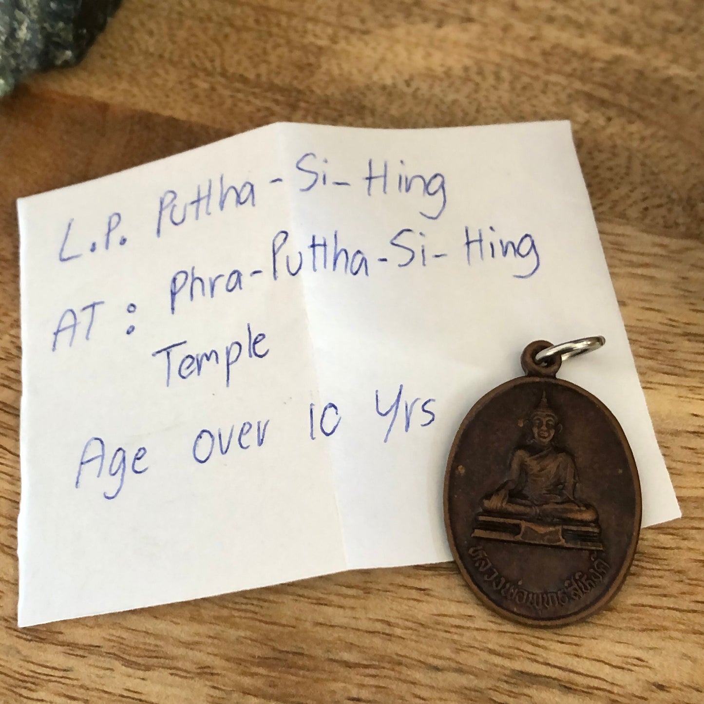 LP Puttha Si Hing, At Phra Puttha Si Hing Temple, Amulet Buddha pendant from  Thailand, Age 10 years